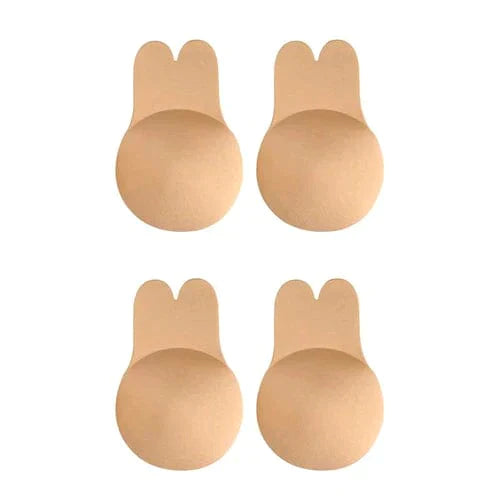 Set of four beige adhesive lifting bra stick on cups with pull tabs for backless dresses