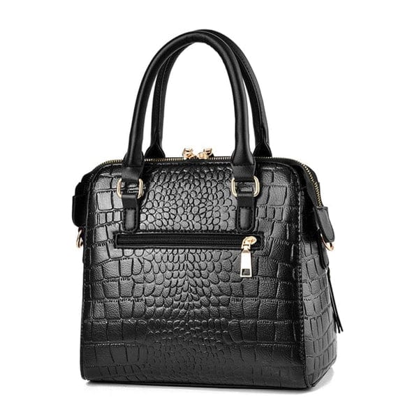 Black structured crocodile leather handbag with double top handles gold hardware and front zip pocket