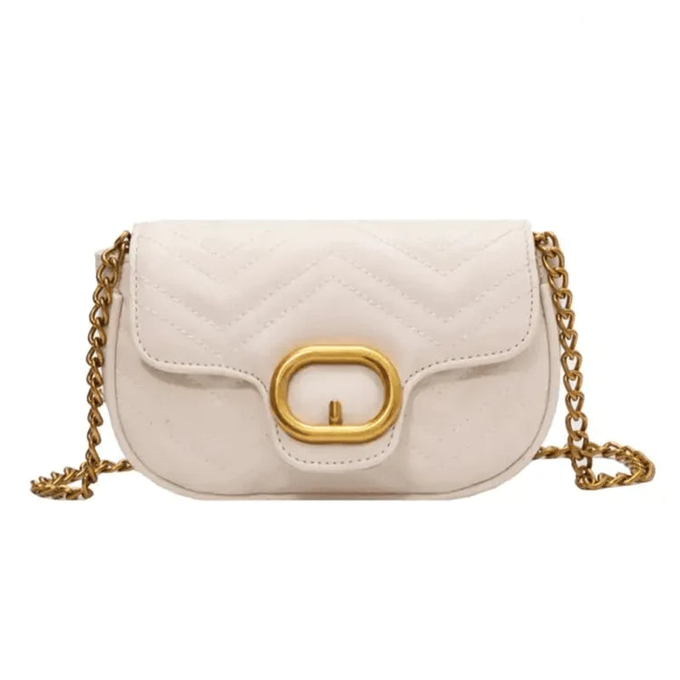 luxury minimalist leather bag cream quilted crossbody with gold oval clasp and chain strap