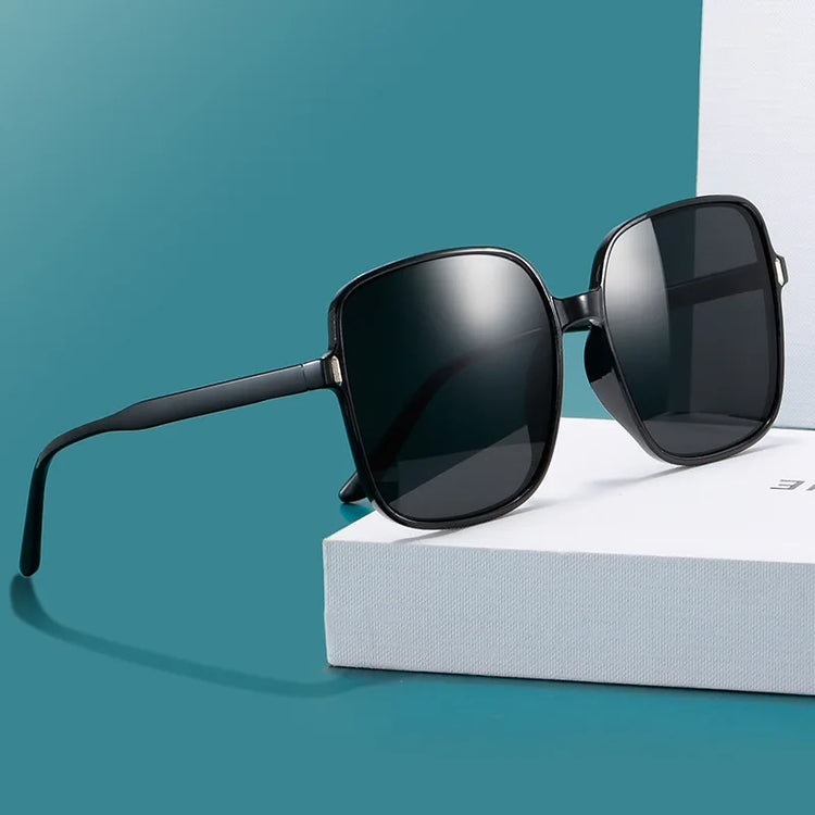 Black oversized square sunglasses on white display box with polarized lenses summer breeze sunglasses deal