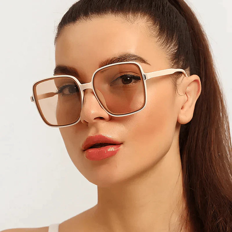 Model wearing white and tan oversized square sunglasses with brown gradient lenses summer breeze sunglasses deal