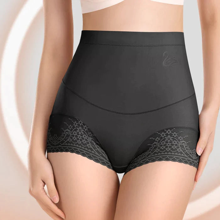 Model wearing black high waist shaping panties kit with lace trim and firm tummy control