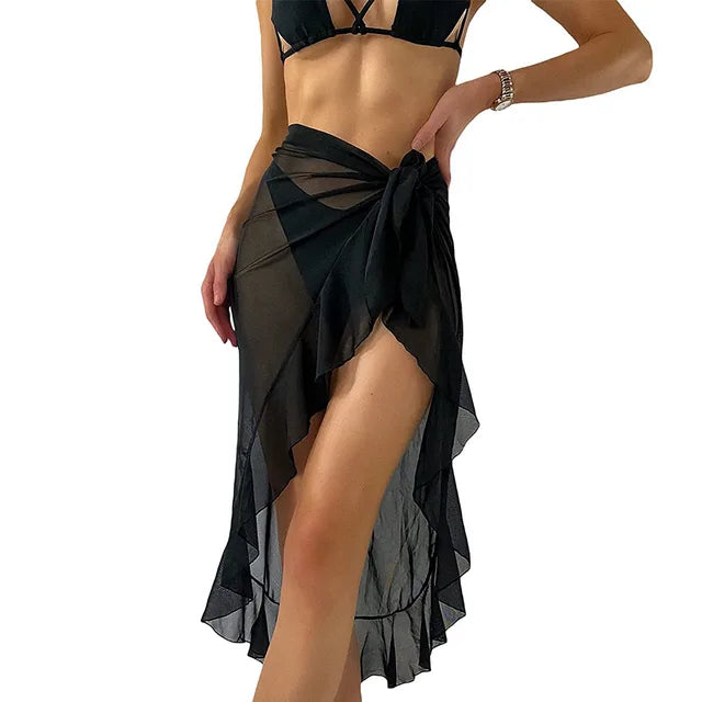 Black sheer summer beach wrap skirt tied at hip over bikini with high slit ruffle hem lightweight cover up