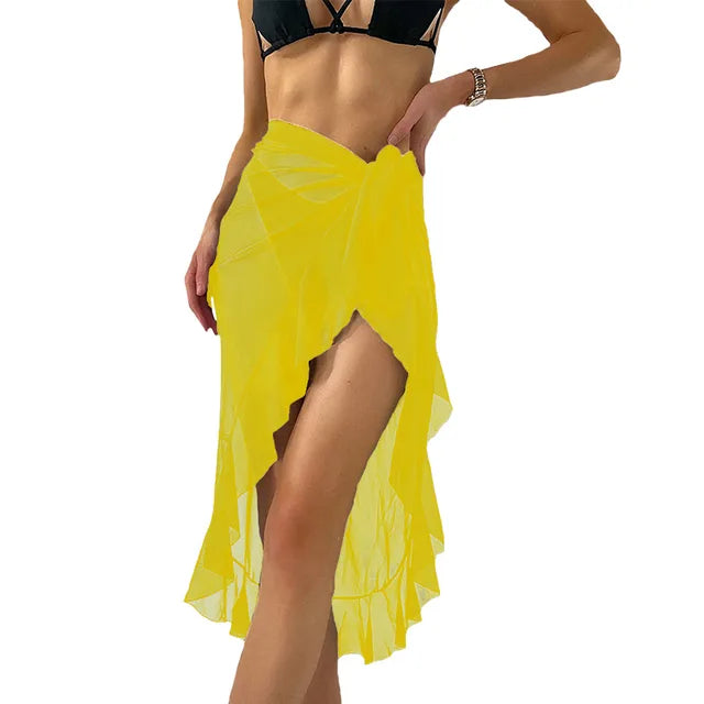 Yellow sheer ruffled summer beach wrap skirt with high slit tied waist shown on model with black bikini top