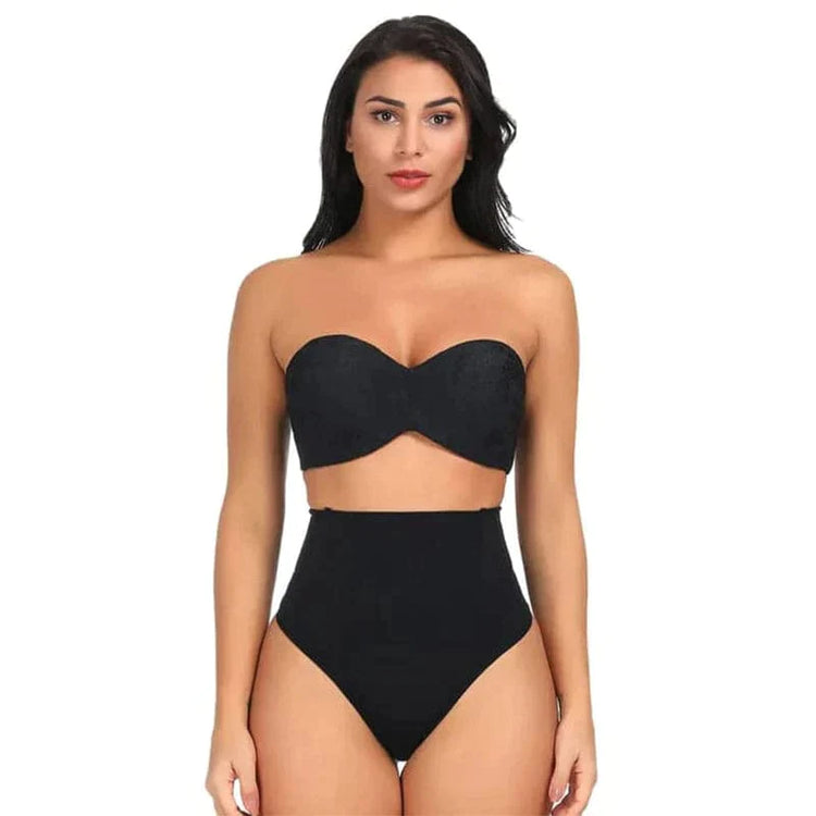 Woman wearing black strapless bra and high waist slimming panty for tummy control and shaping